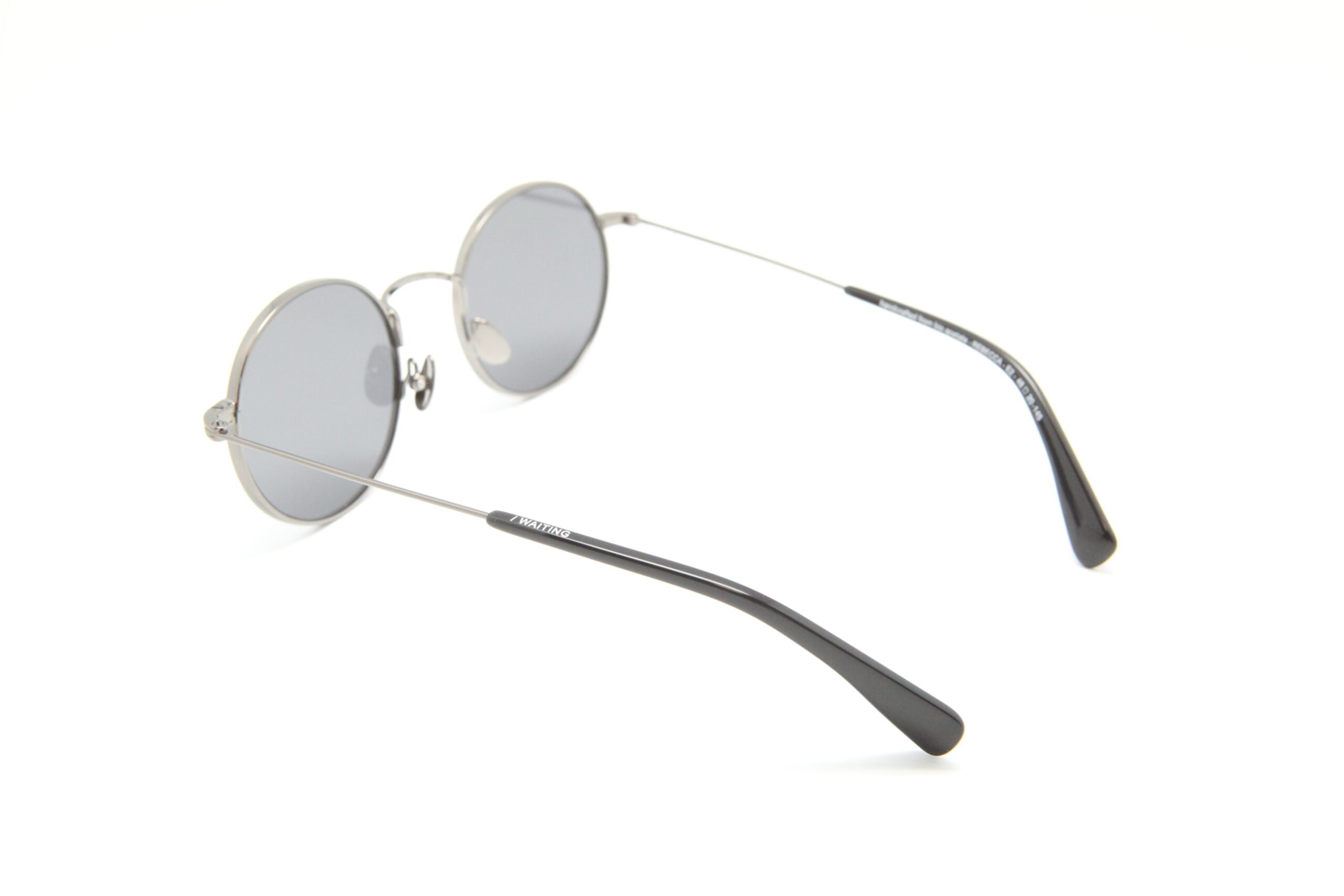 Rebecca E2 — Lunettes rondes acier recyclé, verres noirs polarisés Carl Zeiss